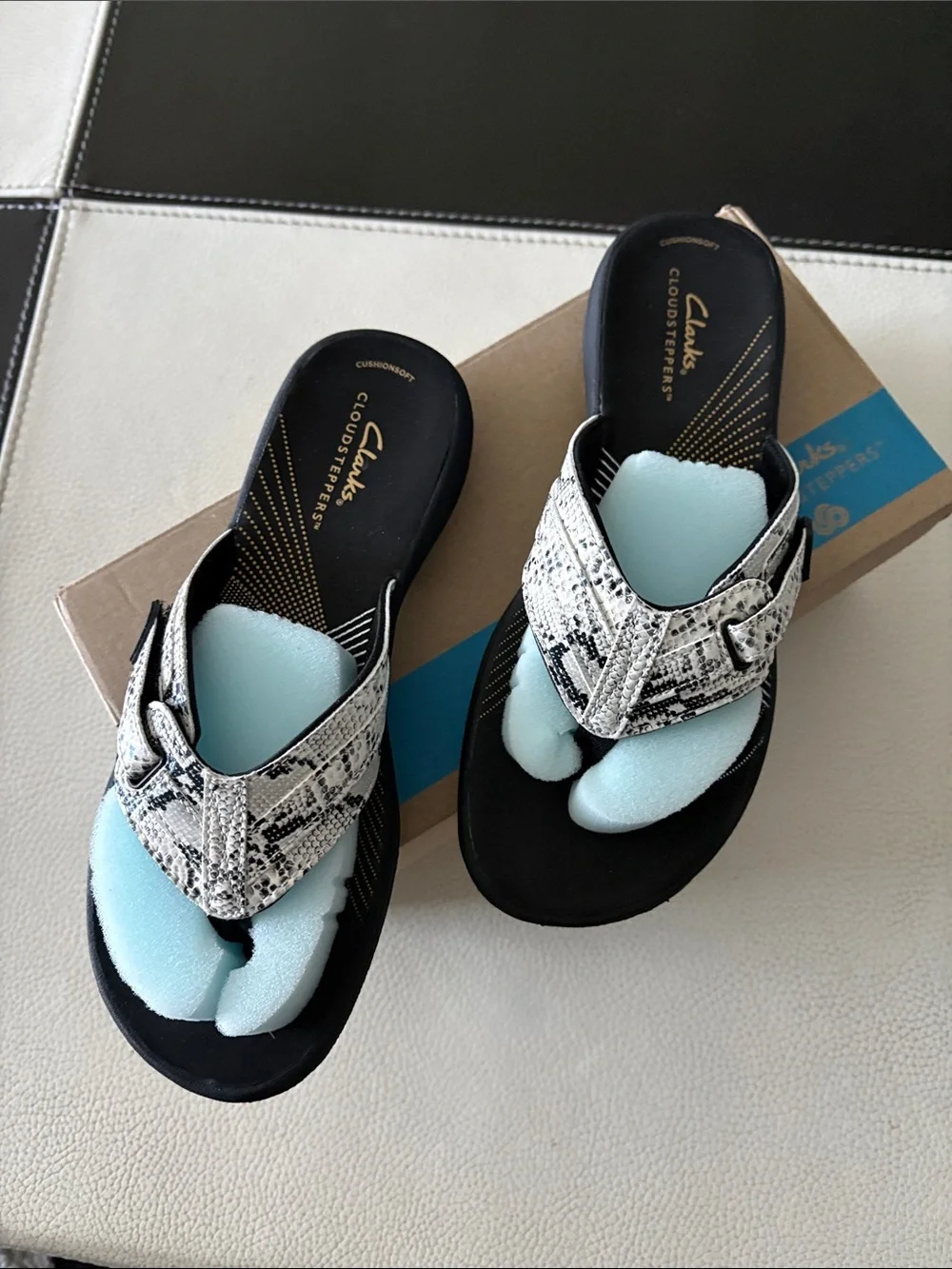 Clarks Women's Breeze Sea Python print sandal